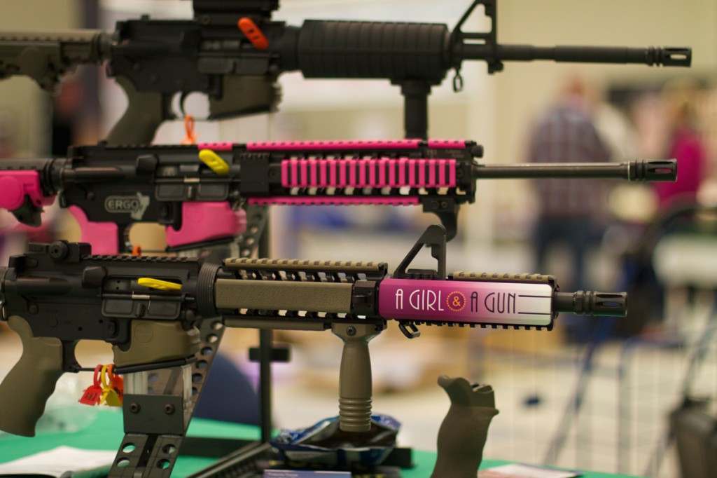Customizable pink AR 15 rifles for sale at the A Girl and A Gun second annual conference in Waco, Texas in March.